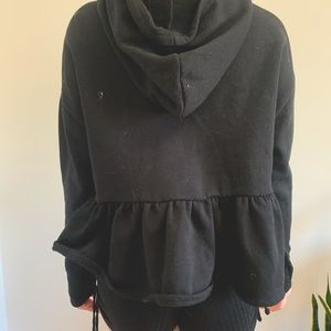 Black long sleeve the top with hood and flared end